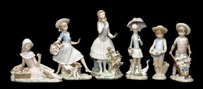 COLLECTION OF LLADRÓ FIGURINES, to include Lladró girl with basket of flowers #4907, Girl with