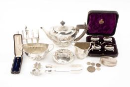 ASSORTED SILVER TABLEWARE, including three-piece bachelor tea service; five-bar toast rack, boxed;