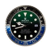 ROLEX-STYLE WALL CLOCK, modelled as a Deepsea Sea-Dweller watch dial, electric movement, 34cms (