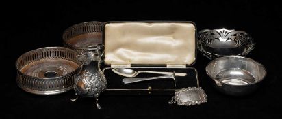 ASSORTED SILVERWARE, comprising late Victorian baluster cream jug 9.5cms, pair bottle coasters 13cms