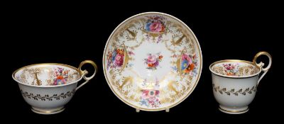 NANTGARW PORCELAIN TRIO, 1818-20, painted with flowers in shallow urns between fruiting vine