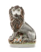 RARE STAFFORDSHIRE POTTERY VAN AMBURGH 'LION & LAMB' FIGURE, c. 1850, seated with large mane over
