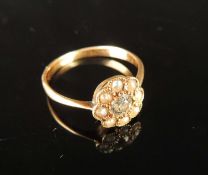 DIAMOND & PEARL FLOWER HEAD RING, central old-cut diamond approx. 0.2ct, bordered with split seed