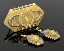 VICTORIAN YELLOW METAL BROOCH, set with centre diamond in seed pearl surround, approx. 45 x 20mms;