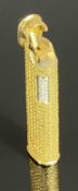 DUNHILL 18K GOLD LIGHTER, with textured detail, diamond set striker, 7cms (h), 85g gross Provenance: