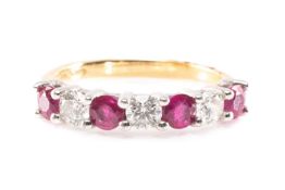 18CT RUBY & DIAMOND 7-STONE RING, single row alternately set brilliant and round cut stones, total