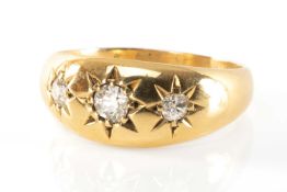 YELLOW METAL THREE STONE DIAMOND 'GYPSY' SET RING, 5.8ms Provenance: private collection Bridgend
