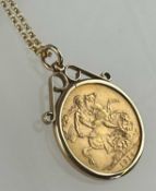GEORGE V 1914 SOVEREIGN, Perth Mint, in 9ct gold pendant mount, suspended from 9ct chain link