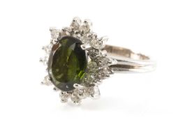 14K WHITE GOLD GREEN GEM & DIAMOND CLUSTER RING, ring size K, 4.6g Provenance: private collection