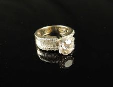 DIAMOND CLUSTER RING, centred with a brilliant-cut diamond, approx. 1.5ct, estimated at K/L, I2,