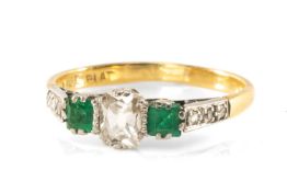 18K EMERALD & DIAMOND RING, central elongated cushion cur diamond appr 4.5 x 3.5mm, flanked by 2