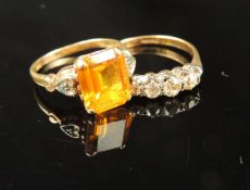 CITRINE AND DIAMOND CHIP DRESS RING, emerald cut citrine of approx.9mm x 7mm, heart shaped shoulders