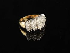 14CT GOLD DIAMOND CLUSTER RING, with 48 tiny brilliants in stepped cluster settings, size M, 7.9g