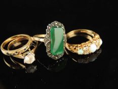 OPAL CLUSTER RING, three cabochon stones dispersed with four white coloured gemstones, all set in