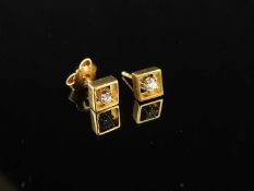 PAIR OF DIAMOND EAR STUDS, brilliant-cut stones approx. 0.05ct, in an open square mount, unmarked