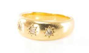 YELLOW METAL THREE STONE 'GYPSY' SET RING, ring size L, 6.2g Provenance: deceased estate