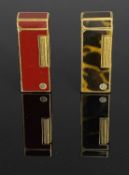 TWO DUNHILL GOLD-PLATED & ENAMELLED POCKET LIGHTERS, one burgundy, one tortoiseshell Provenance: