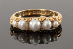 ANTIQUE 18CT PEARL RING, hallmarked for 1911, five graduated split freshwater pearls in scrolling