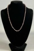 NATURAL BLACK PEARL NECKLACE, with 9ct gold clasp, 43cms (l) Provenance: private collection