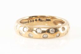 9CT GOLD DIAMOND HALF HOOP RING, set with thirteen diamonds, ring size O, 4.4g Provenance: private