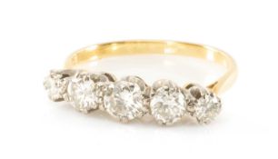 YELLOW METAL FIVE STONE DIAMOND RING, the graduated claw-set stones measuring 0.8cts overall