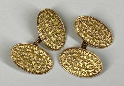 PAIR OF GEORGE V ROSE GOLD CUFFLINKS, oval shape, engraved foliate decoration, 5.2g Provenance:
