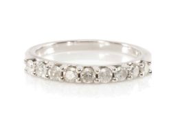 9K WHITE GOLD NINE STONE DIAMOND RING, ring size N 1/2, 2.3g Provenance: private collection