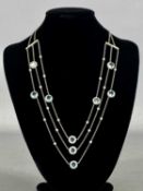18CT WHITE GOLD AQUAMARINE & DIAMOND THREE-STRAND NECKLACE, 44cms (l) Provenance: private colleciton
