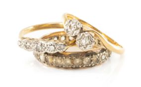 TWO YELLOW METAL DIAMOND SET RINGS, one stamped '18ct', 4.7g gross, together with a 9ct gold white