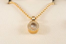CHOPARD 18CT GOLD 'LUCKY DIAMONDS' PENDANT NECKLACE, oval window pendant with diamond border