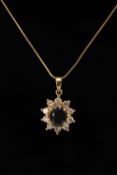 18CT GOLD SAPPHIRE & DIAMOND CLUSTER PENDANT, the central oval-cut sapphire (8 x 6mms approx.)