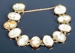 VICTORIAN YELLOW METAL CAMEO SHELL PORTRAIT BRACELET, with eleven panels Provenance: deceased estate