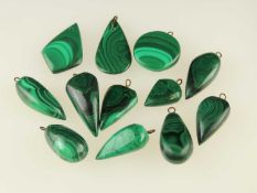 NUMBER OF MALACHITE PENDANTS Provenance: private collection Cheshire