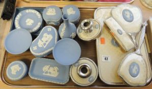 TRAY OF WEDGWOOD BLUE JASPERWARE ORNAMENTS including a dressing table set Provenance: private