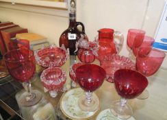 COLLECTION OF ANTIQUE CRANBERRY GLASS, together with amber glass whisky flask