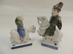 TWO RYE POTTERY MODELS OF CHAUCER -STYLE CHARACTER HORSE RIDERS Provenance: private collection
