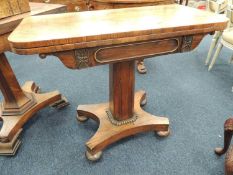 LATE REGENCY ROSEWOOD FOLDING PEDESTAL CARD TABLE c. 1820, 78 (h) x 90.5cms (w) Provenance: