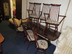 ERCOL DARK STAINED DINING SUITE, comprising dining table 80 x 180cms, and set of eight stick back