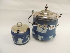 WEDGWOOD BLUE JASPERWARE BISCUIT BARREL, with EPNS cover and handle, together with a similar