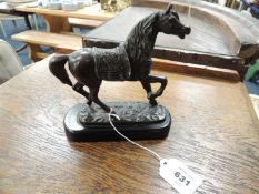 LATE VICTORIAN PATINATED SPELTER FIGURE OF A HORSE, on an ebonised wooden base, height 16cm