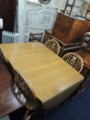 1960s LIGHT OAK KITCHEN TABLE with drop-leaves, 121 x 85cms Provenance: private collection Cheshire