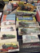 TWO HORNBY DUBLO CUTOUT CARD ADVERTISING BOARDS, two Kitmaster and four Airfix model train kits,