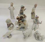 GROUP OF NINE LLADRÓ CERAMIC ORNAMENTS, including 'Eskimo Riders' Provenance: private collection