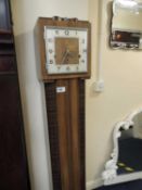 ART DECO WALNUT CHIMING GRANDDAUGHTER CLOCK, 155cms (h) Provenance: private collection Cheshire