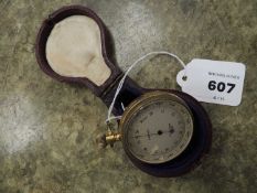 ELLIOTT BROS., LONDON BRASS POCKET BAROMETER, with fitted case Provenance: private collection