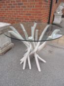 DECORATIVE MODERN PLATE GLASS TOPPED TABLE, with driftwood style wooden cluster base, 100cm (d)