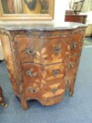 ITALIAN WALNUT AND MARQUETRY COMMODE, late 19th Century, with black painted white marble top,
