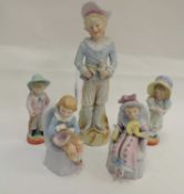 FIVE CONTINENTAL POLYCHROME CERAMIC MODELS of children in their finery Provenance: private