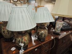 FIVE ORIENTAL CERAMIC TABLE LAMPS, and two further pottery table lamps (7)