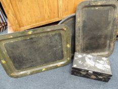 THREE 19TH CENTURY TOLEWARE SERVING TRAYS, largest 78 x 57cms, and a Chinese mother of pearl